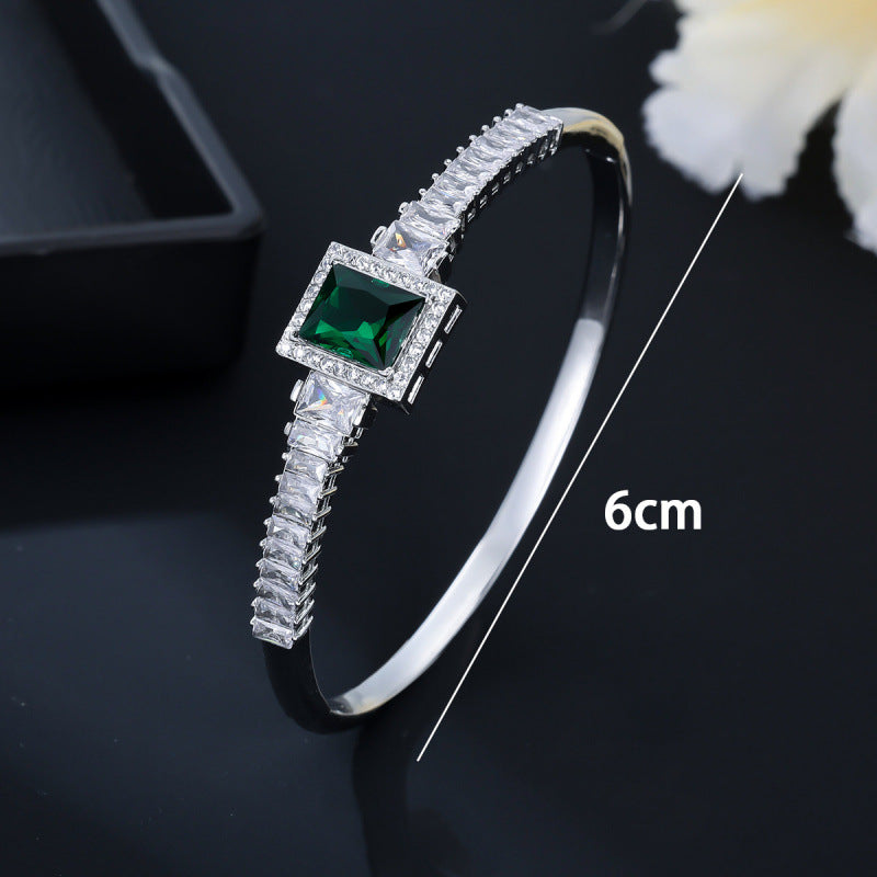 Golden Plated Copper Bangle With Electroplated Finish Featuring May Birthstone Emerald Zircon Inlay