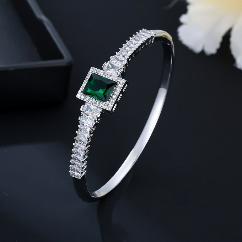 Golden Plated Copper Bangle With Electroplated Finish Featuring May Birthstone Emerald Zircon Inlay