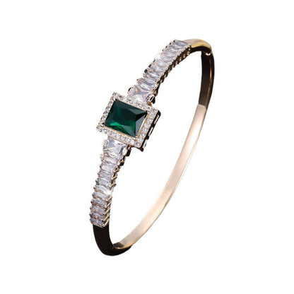 Golden Plated Copper Bangle With Electroplated Finish Featuring May Birthstone Emerald Zircon Inlay