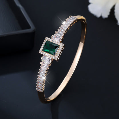 Golden Plated Copper Bangle With Electroplated Finish Featuring May Birthstone Emerald Zircon Inlay