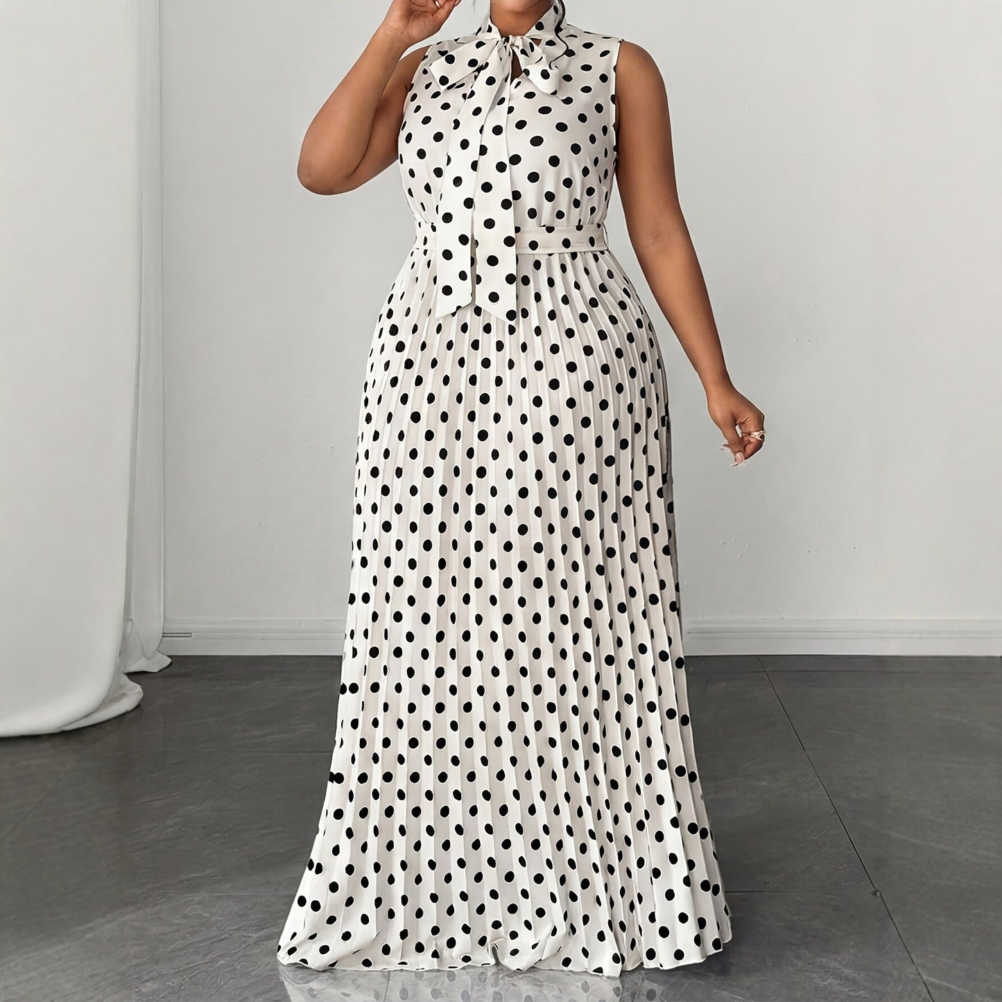 Elegant Women’s Sleeveless Polka Dot Dress In Polyester Fabric For Daily Wear
