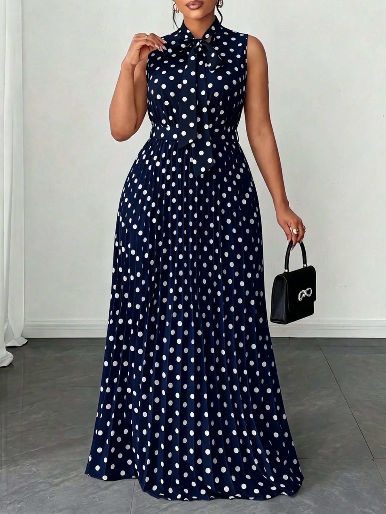 Elegant Women’s Sleeveless Polka Dot Dress In Polyester Fabric For Daily Wear
