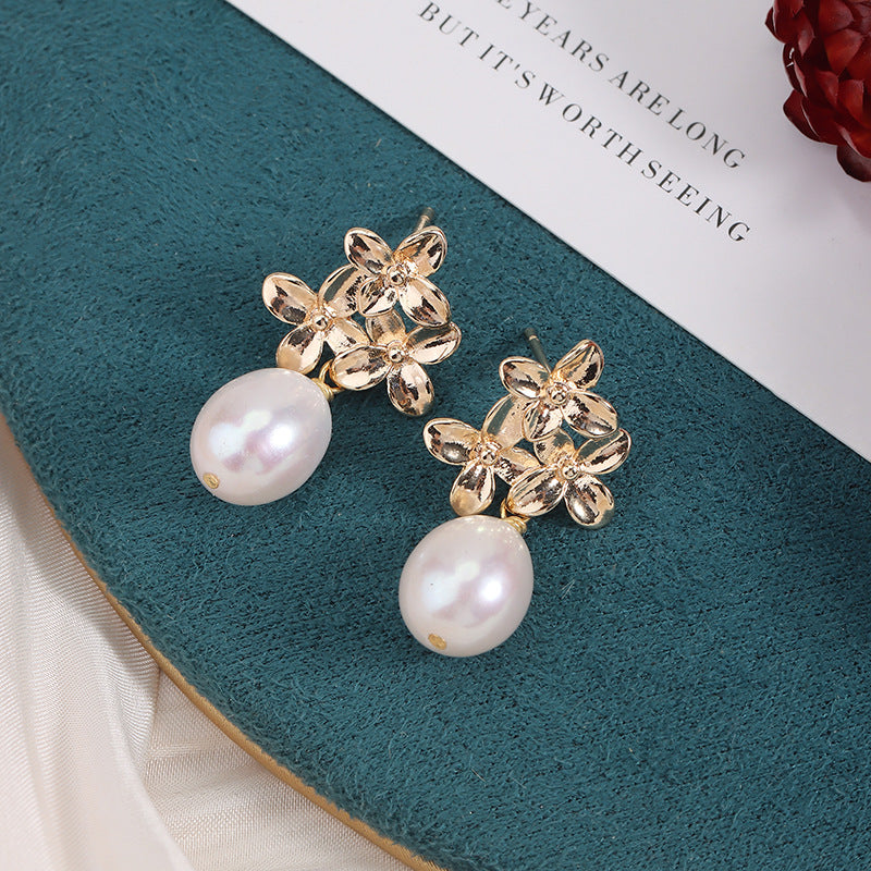 Simple Style Freshwater Pearl Earrings For Women Featuring Natural White 9-10mm Rice-Shaped Pearls