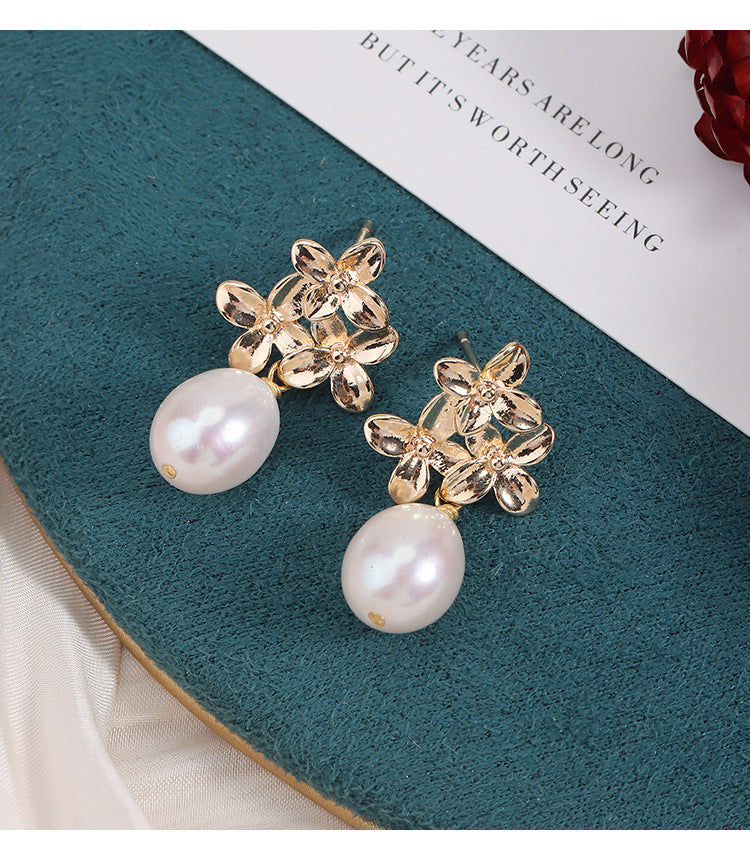Simple Style Freshwater Pearl Earrings For Women Featuring Natural White 9-10mm Rice-Shaped Pearls