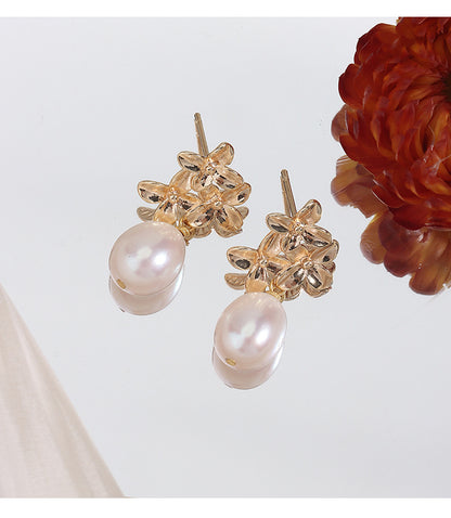 Simple Style Freshwater Pearl Earrings For Women Featuring Natural White 9-10mm Rice-Shaped Pearls