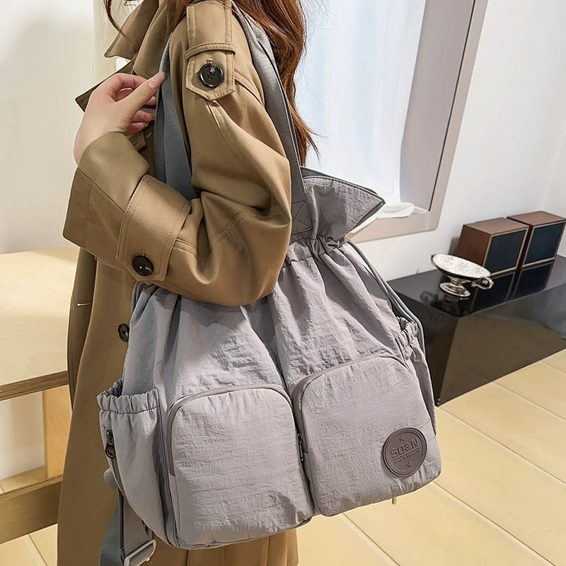 Solid Color Nylon Functional Backpack For Women With Sewing Thread Detail, Double Shoulder Straps, Ideal For Spring And Summer