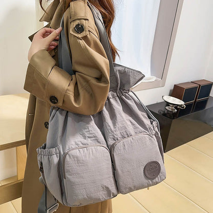 Solid Color Nylon Functional Backpack For Women With Sewing Thread Detail, Double Shoulder Straps, Ideal For Spring And Summer