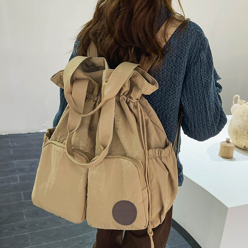 Solid Color Nylon Functional Backpack For Women With Sewing Thread Detail, Double Shoulder Straps, Ideal For Spring And Summer
