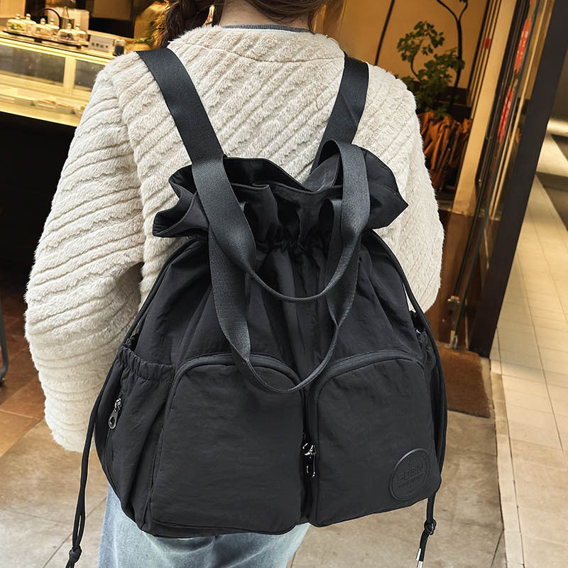 Solid Color Nylon Functional Backpack For Women With Sewing Thread Detail, Double Shoulder Straps, Ideal For Spring And Summer