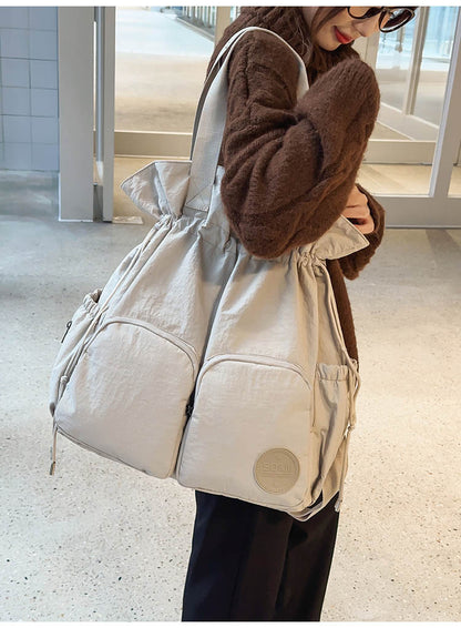 Solid Color Nylon Functional Backpack For Women With Sewing Thread Detail, Double Shoulder Straps, Ideal For Spring And Summer