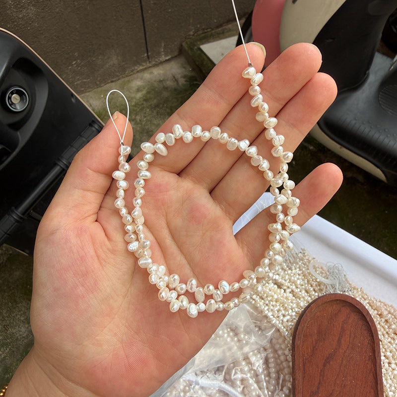 Long Necklace Featuring Natural White Freshwater Baroque Style Pearls With 3-4mm Baroque Pearl Diameter