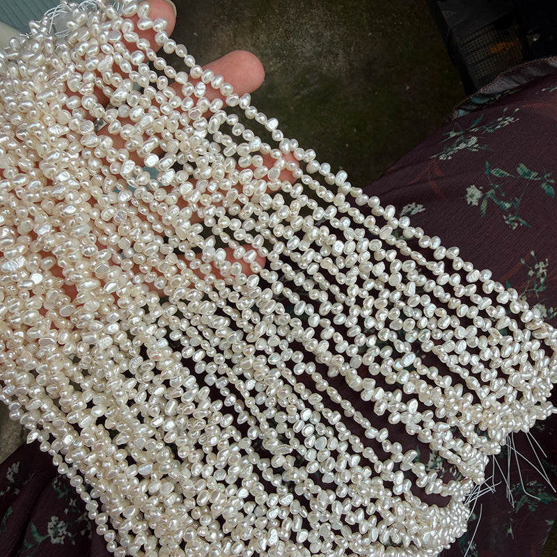 Long Necklace Featuring Natural White Freshwater Baroque Style Pearls With 3-4mm Baroque Pearl Diameter