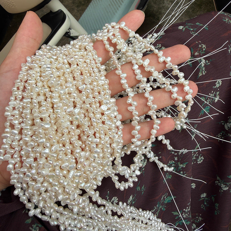 Long Necklace Featuring Natural White Freshwater Baroque Style Pearls With 3-4mm Baroque Pearl Diameter