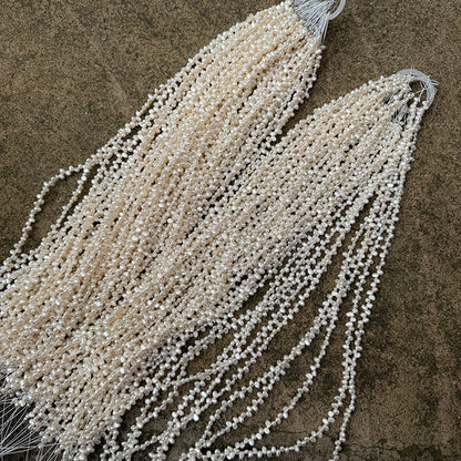 Long Necklace Featuring Natural White Freshwater Baroque Style Pearls With 3-4mm Baroque Pearl Diameter