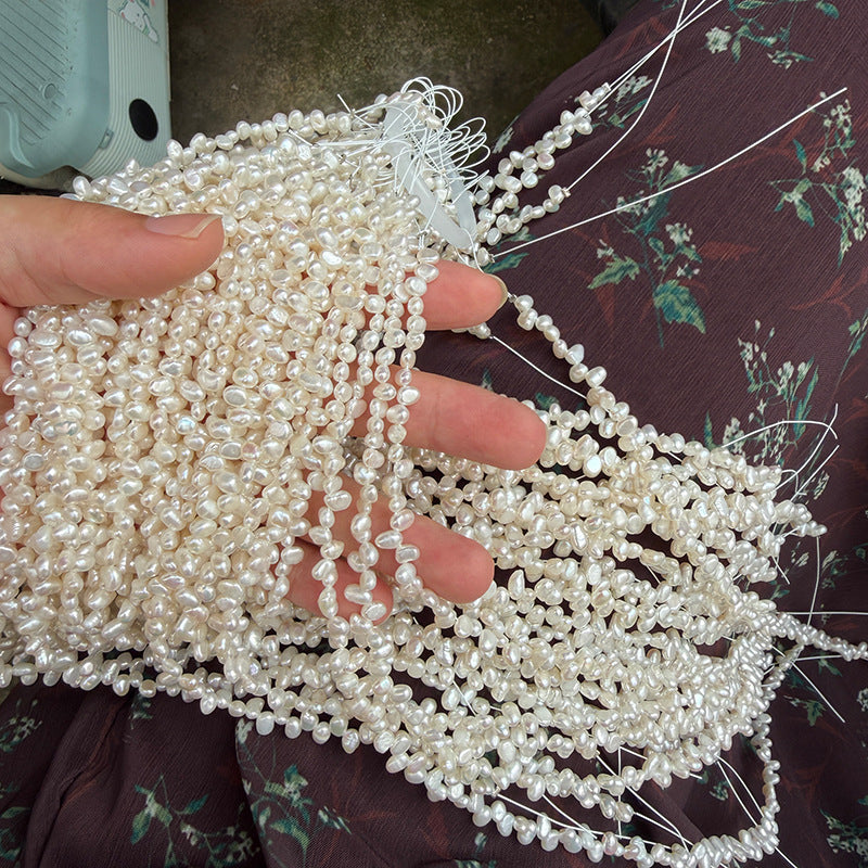 Long Necklace Featuring Natural White Freshwater Baroque Style Pearls With 3-4mm Baroque Pearl Diameter