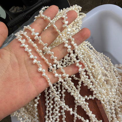 Long Necklace Featuring Natural White Freshwater Baroque Style Pearls With 3-4mm Baroque Pearl Diameter