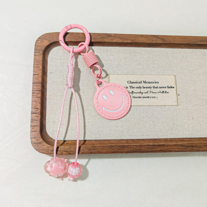 Christmas Smiley Face Key Chain In Natural Pink Featuring Zinc Alloy Bag Charm