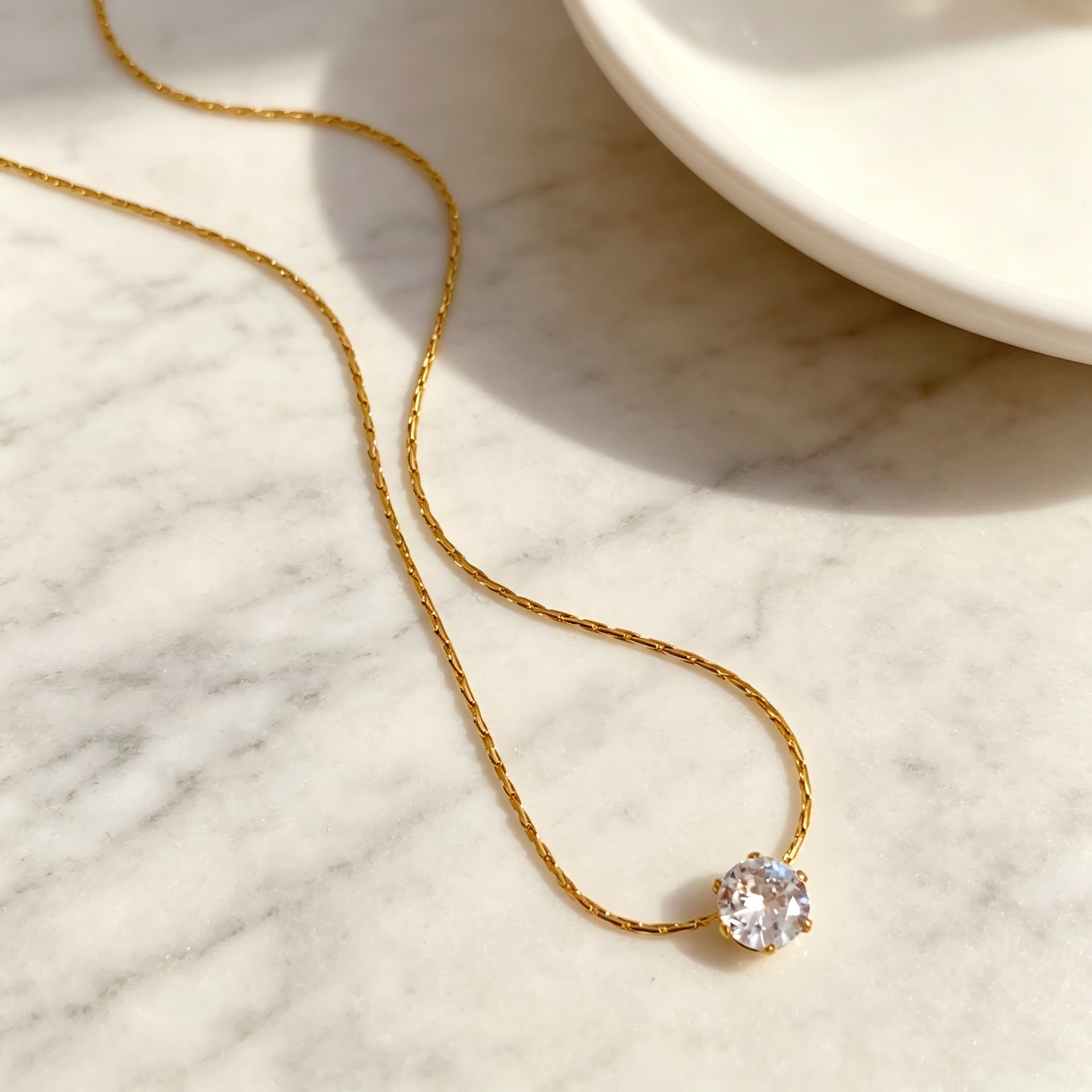 Geometric Gold Pendant Necklace In Titanium Steel With Zircon Inlay And Claw Setting, Featuring Coffee Bean Chain