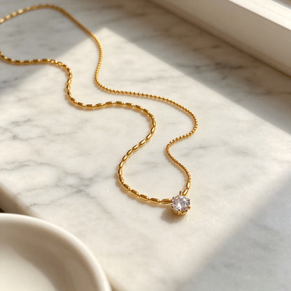 Geometric Gold Pendant Necklace In Titanium Steel With Zircon Inlay And Claw Setting, Featuring Coffee Bean Chain