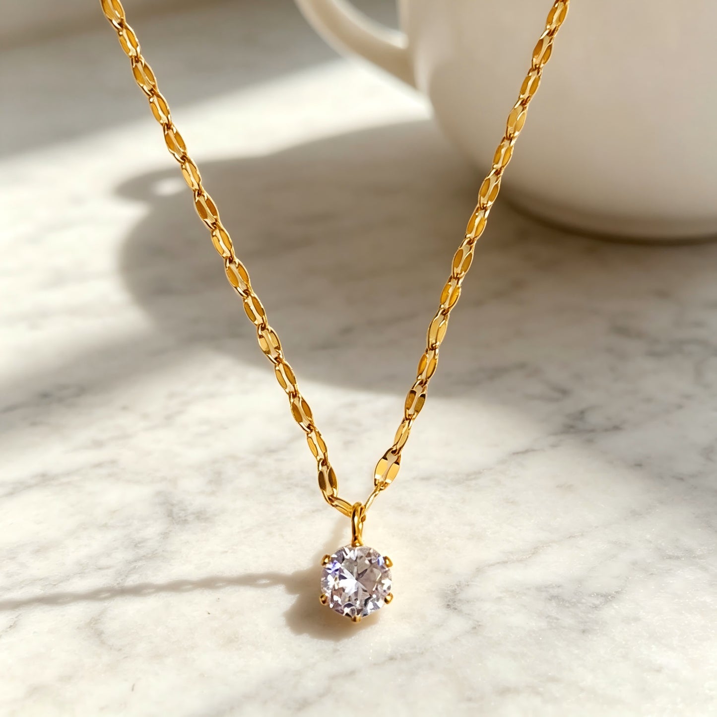 Geometric Gold Pendant Necklace In Titanium Steel With Zircon Inlay And Claw Setting, Featuring Coffee Bean Chain