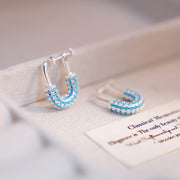A Pair of Thick Silver Blue Turquoise Stones