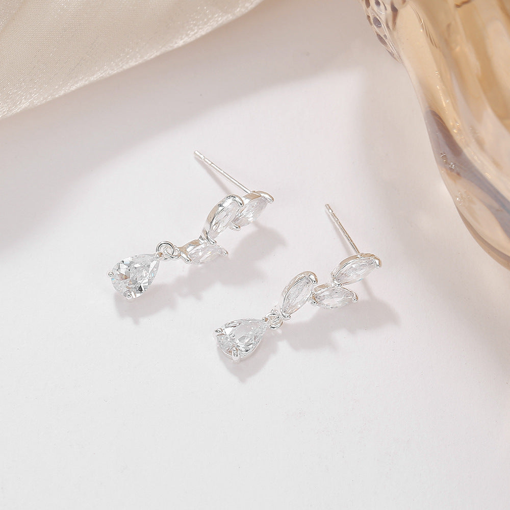 Gold Water Droplets Earrings For Women Featuring Copper Studs And Zircon Inlay Material
