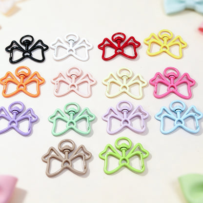 Alloy Keychain Accessory With Bow Tie Pattern Featuring Stoving Varnish And Spring Ring Trigger Clasp Closure In Simple Style