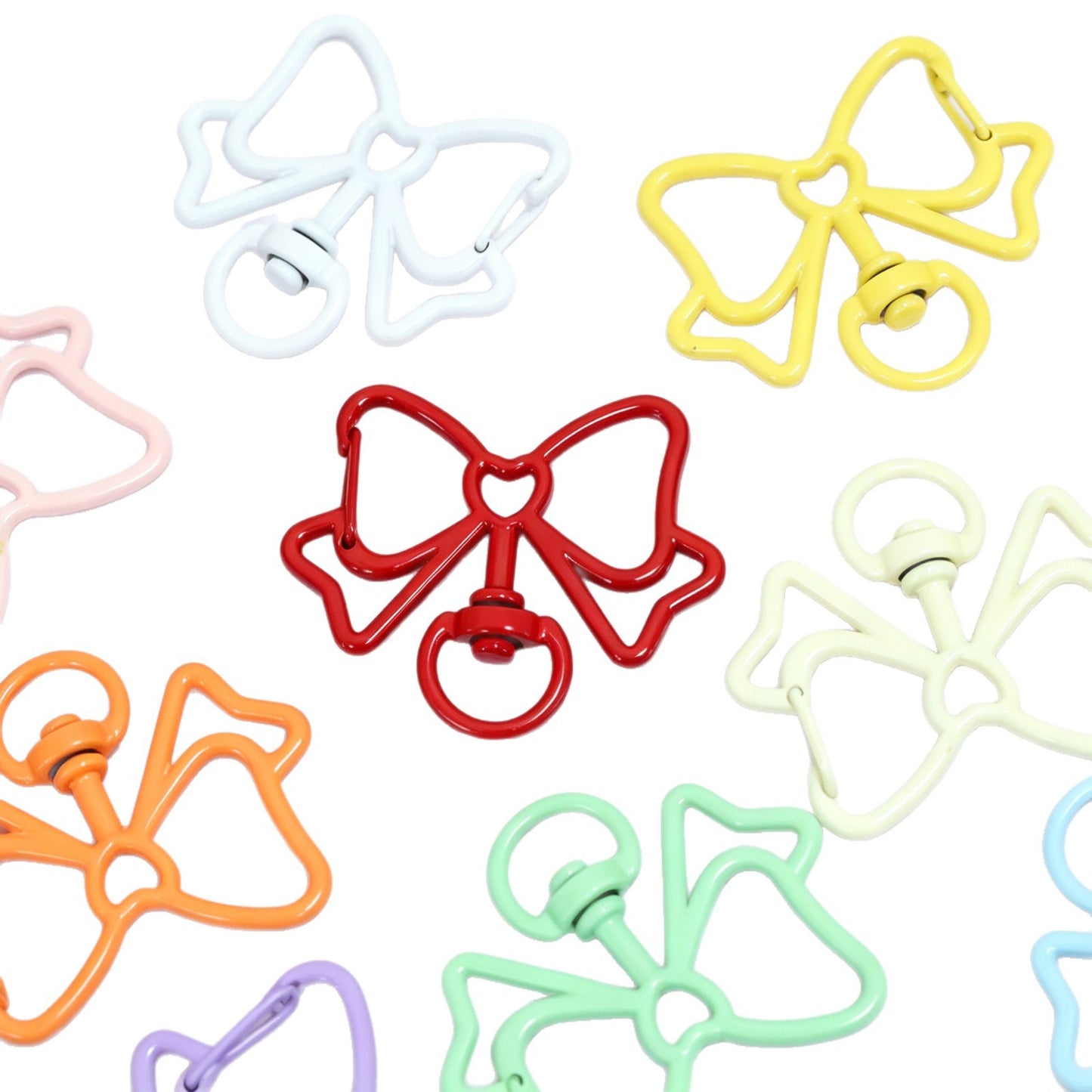 Alloy Keychain Accessory With Bow Tie Pattern Featuring Stoving Varnish And Spring Ring Trigger Clasp Closure In Simple Style