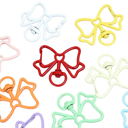 Alloy Keychain Accessory With Bow Tie Pattern Featuring Stoving Varnish And Spring Ring Trigger Clasp Closure In Simple Style