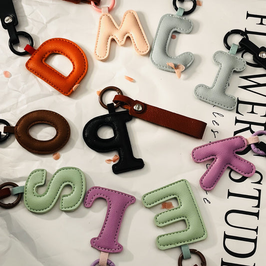 Letter Pattern Bag Charm Key Chain In PU Leather With PU Inlay Material