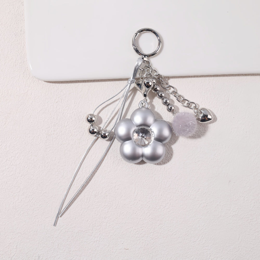 Dyed Black Flowers Bag Pendant With Diamond Inlay In Metal, Stylish Key Chain Accessory