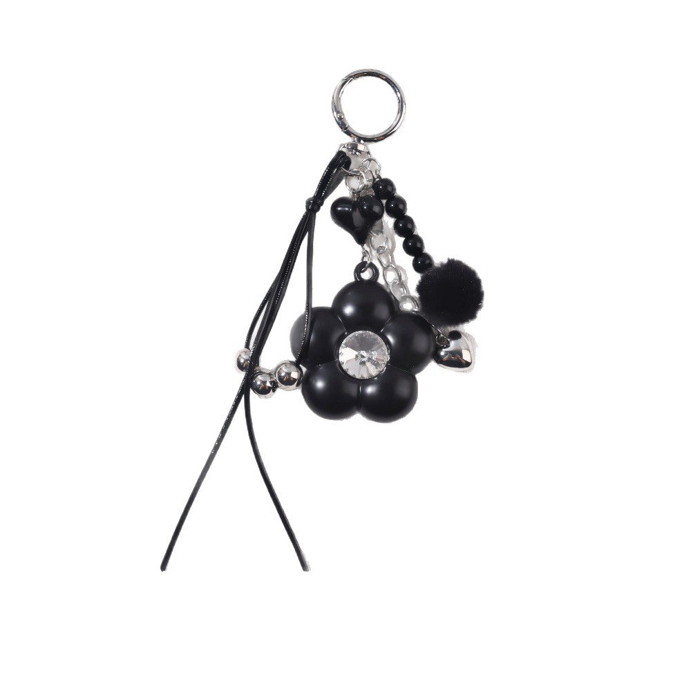 Dyed Black Flowers Bag Pendant With Diamond Inlay In Metal, Stylish Key Chain Accessory