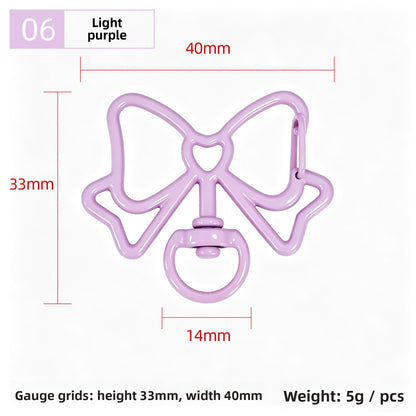 Alloy Keychain Accessory With Bow Tie Pattern Featuring Stoving Varnish And Spring Ring Trigger Clasp Closure In Simple Style