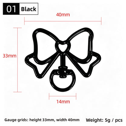 Alloy Keychain Accessory With Bow Tie Pattern Featuring Stoving Varnish And Spring Ring Trigger Clasp Closure In Simple Style