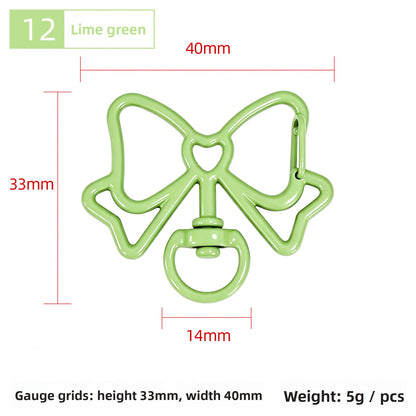 Alloy Keychain Accessory With Bow Tie Pattern Featuring Stoving Varnish And Spring Ring Trigger Clasp Closure In Simple Style