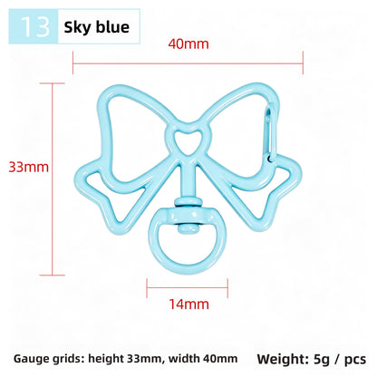 Alloy Keychain Accessory With Bow Tie Pattern Featuring Stoving Varnish And Spring Ring Trigger Clasp Closure In Simple Style