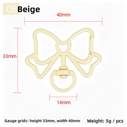 Alloy Keychain Accessory With Bow Tie Pattern Featuring Stoving Varnish And Spring Ring Trigger Clasp Closure In Simple Style