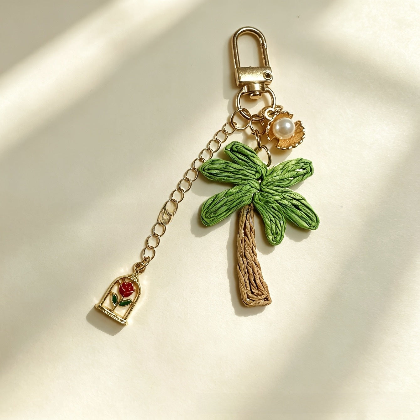Starfish Knitting Key Chain In Green With Straw Material, Featuring A Vacation Style Design