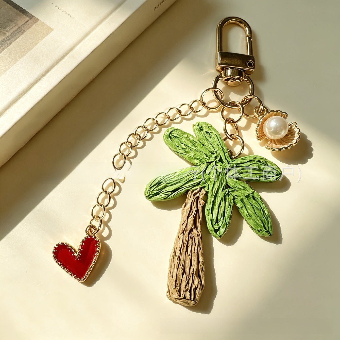 Starfish Knitting Key Chain In Green With Straw Material, Featuring A Vacation Style Design