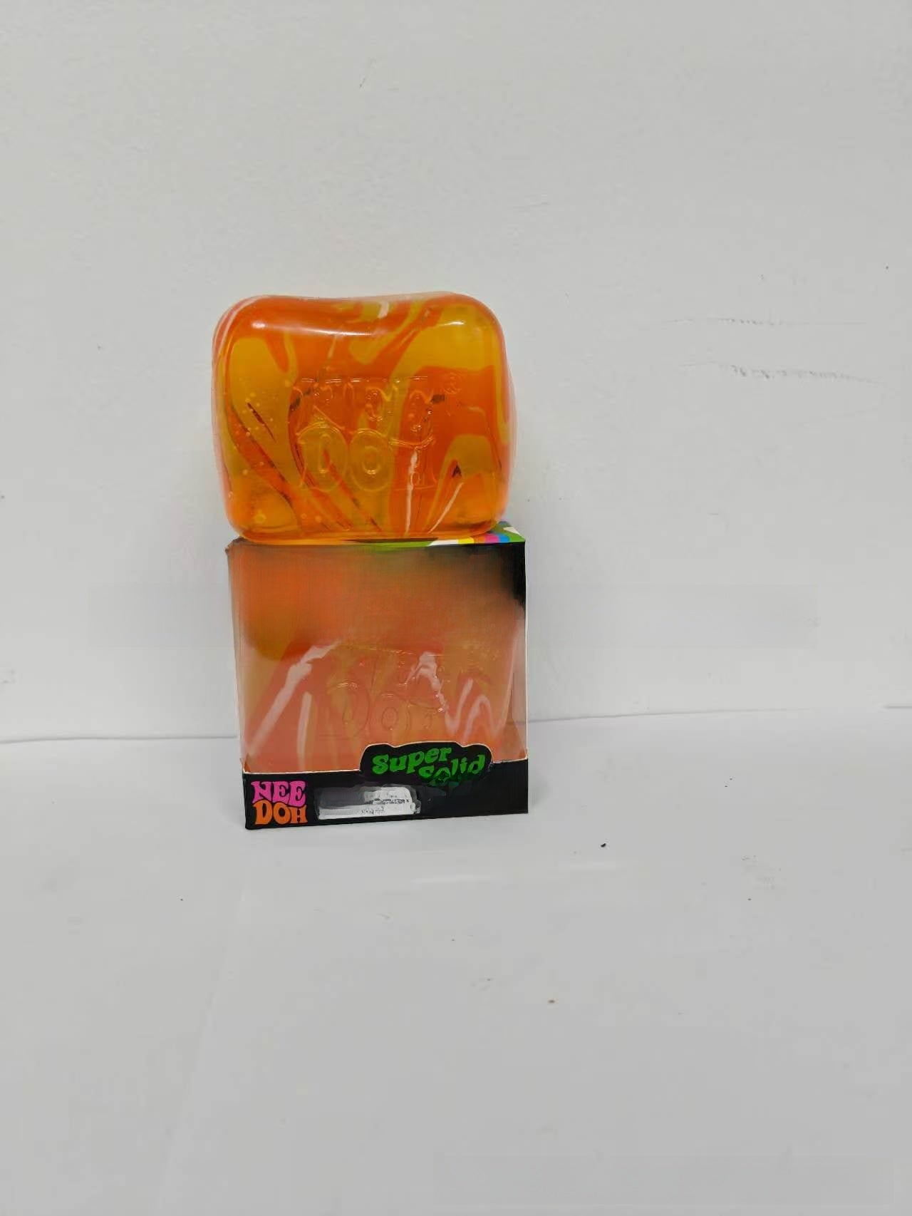 Ice Cube Squishy Toy Made Of Soft TPR Material In Vibrant Orange For Stress Relief