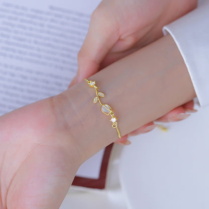 Sweet Tulips Bracelet For Women In Golden Plated Copper With Cat's Eye Stone Featuring Electroplated Finish