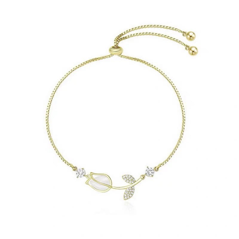Sweet Tulips Bracelet For Women In Golden Plated Copper With Cat's Eye Stone Featuring Electroplated Finish