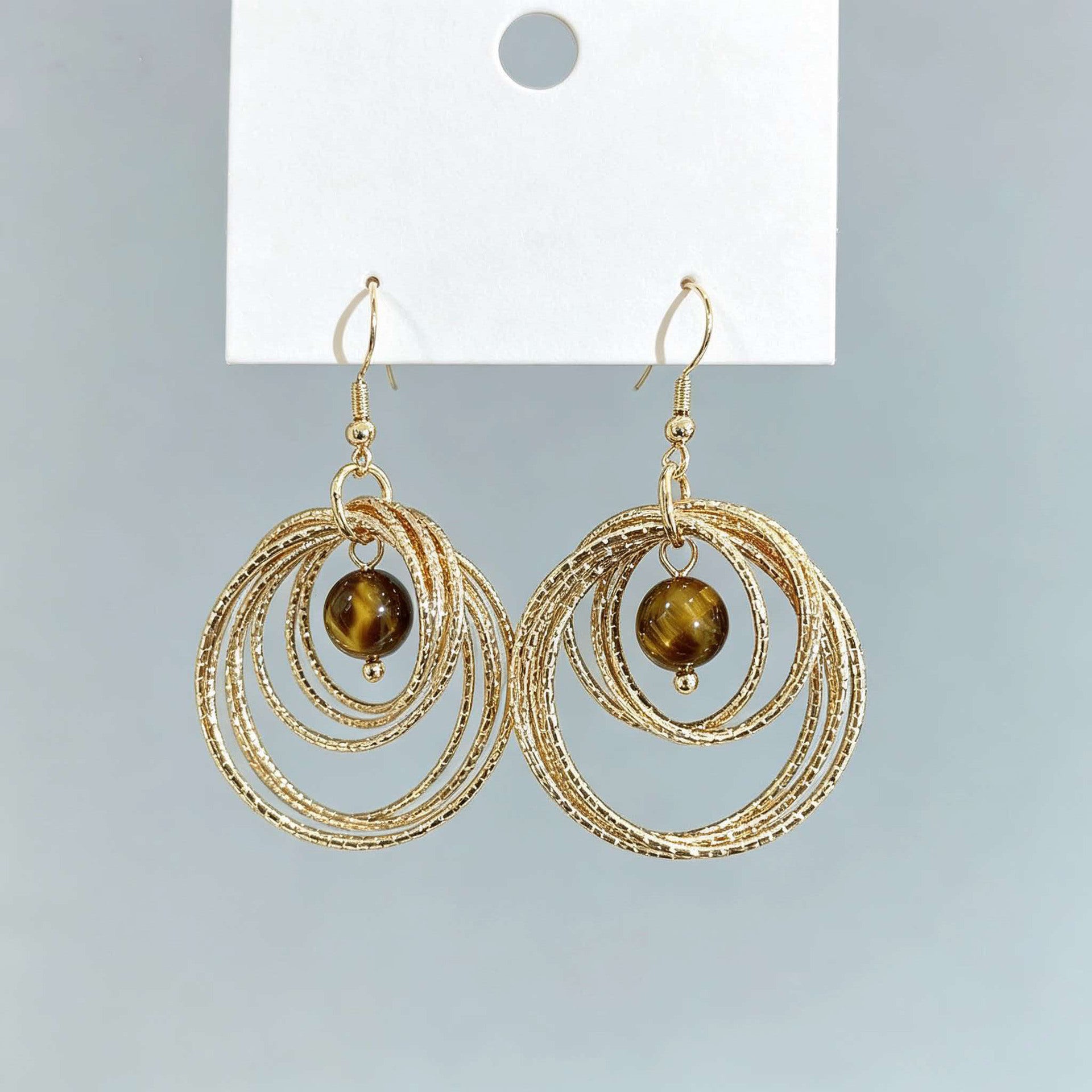 IG Style Round Twist Earrings For Women In KC Golden Plated Metal With 0.03µm Coating Thickness
