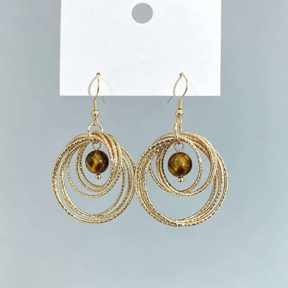 IG Style Round Twist Earrings For Women In KC Golden Plated Metal With 0.03µm Coating Thickness