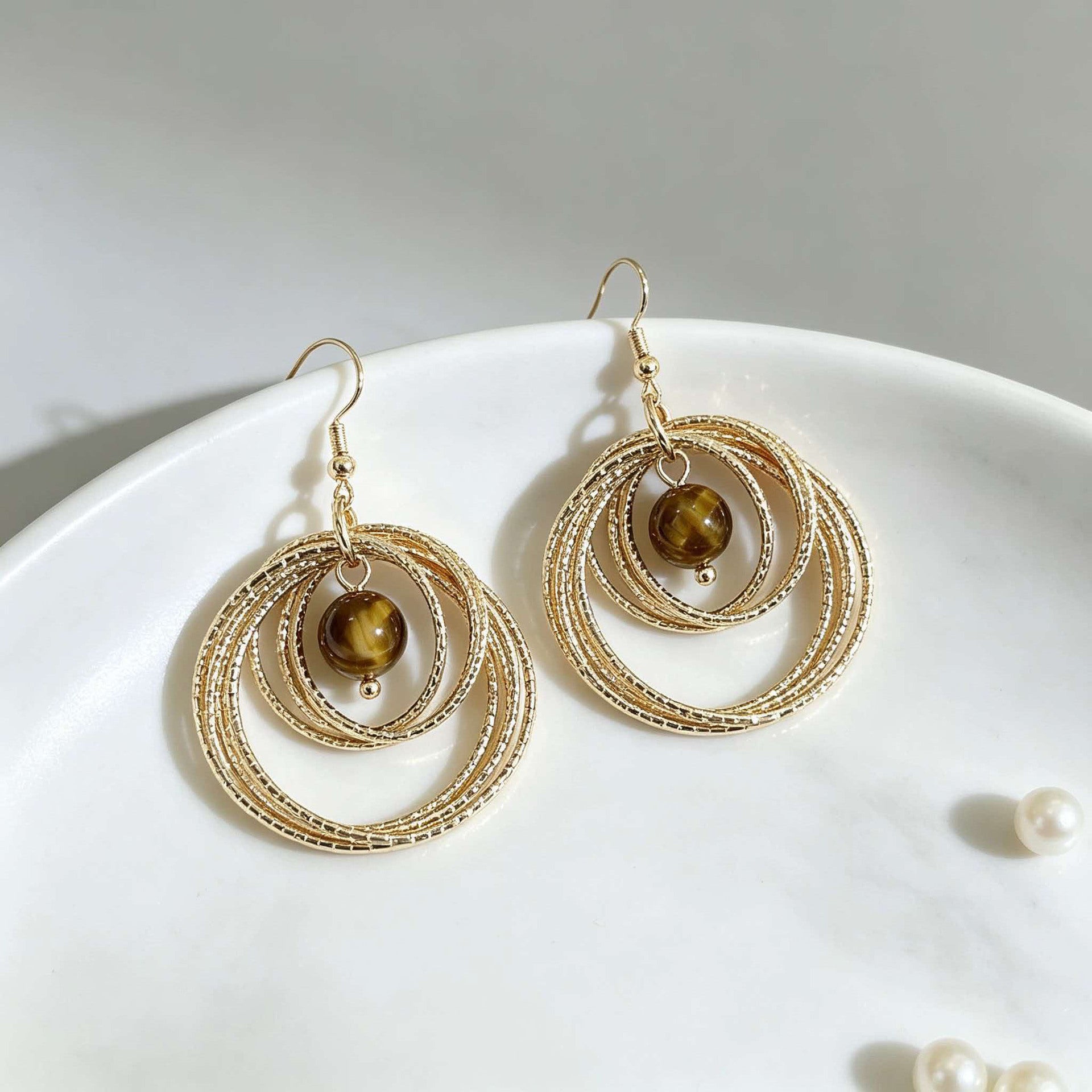 IG Style Round Twist Earrings For Women In KC Golden Plated Metal With 0.03µm Coating Thickness
