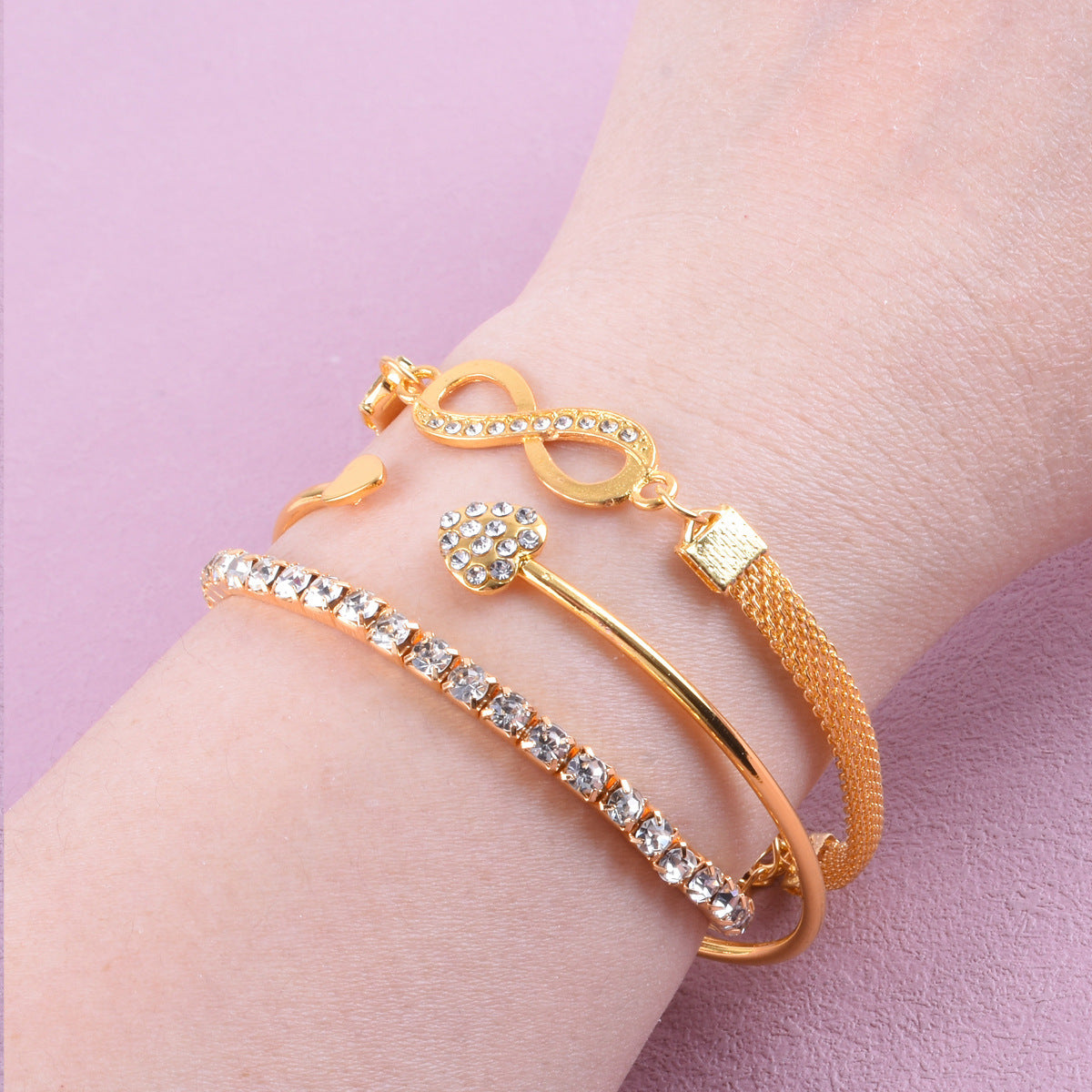Heart Shape Gold Alloy Bangle For Women In With Electroplated Finish