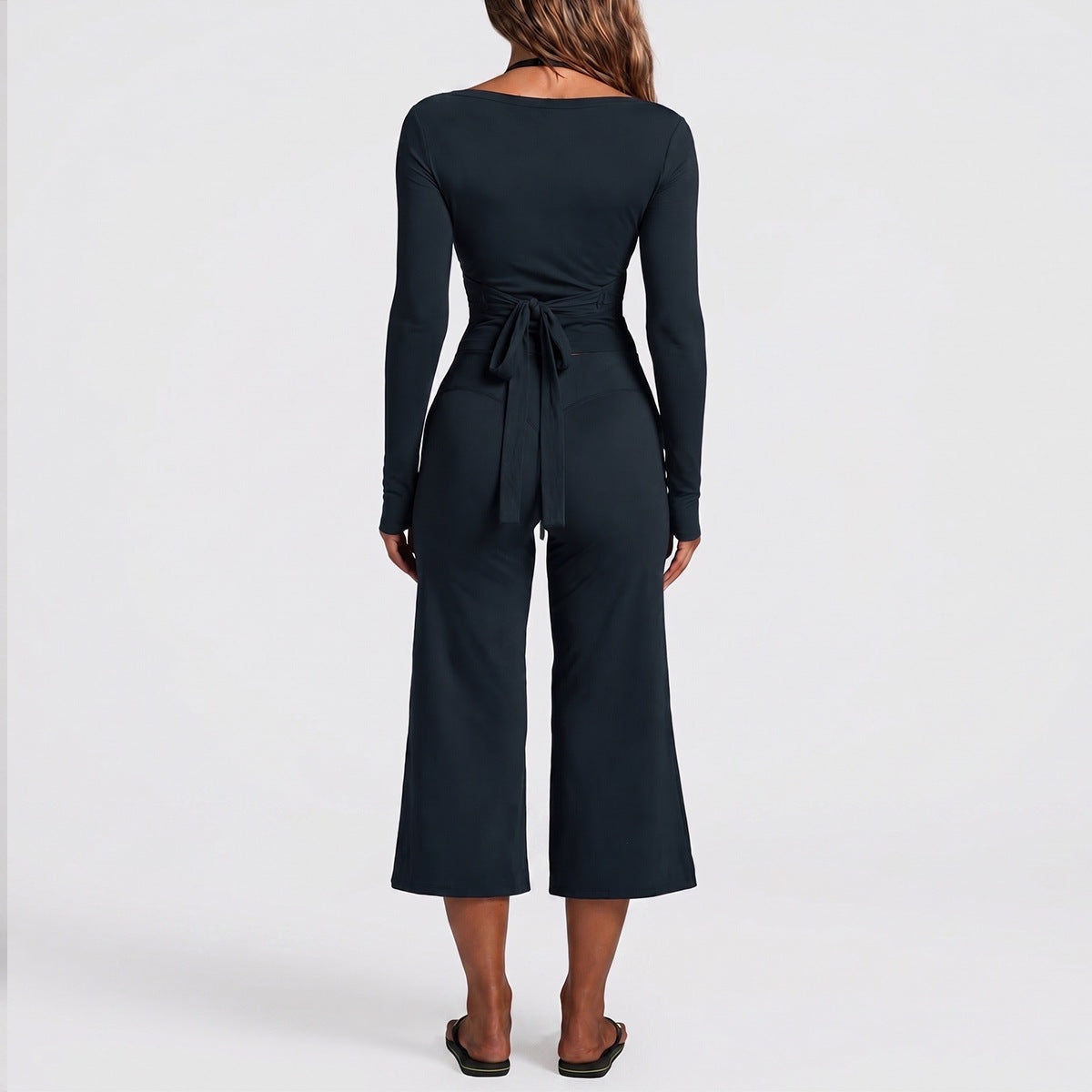Full Length Sport Yoga Jumpsuit For Women In Stretchy Nylon Fabric Featuring Criss Cross Design With Long Sleeves