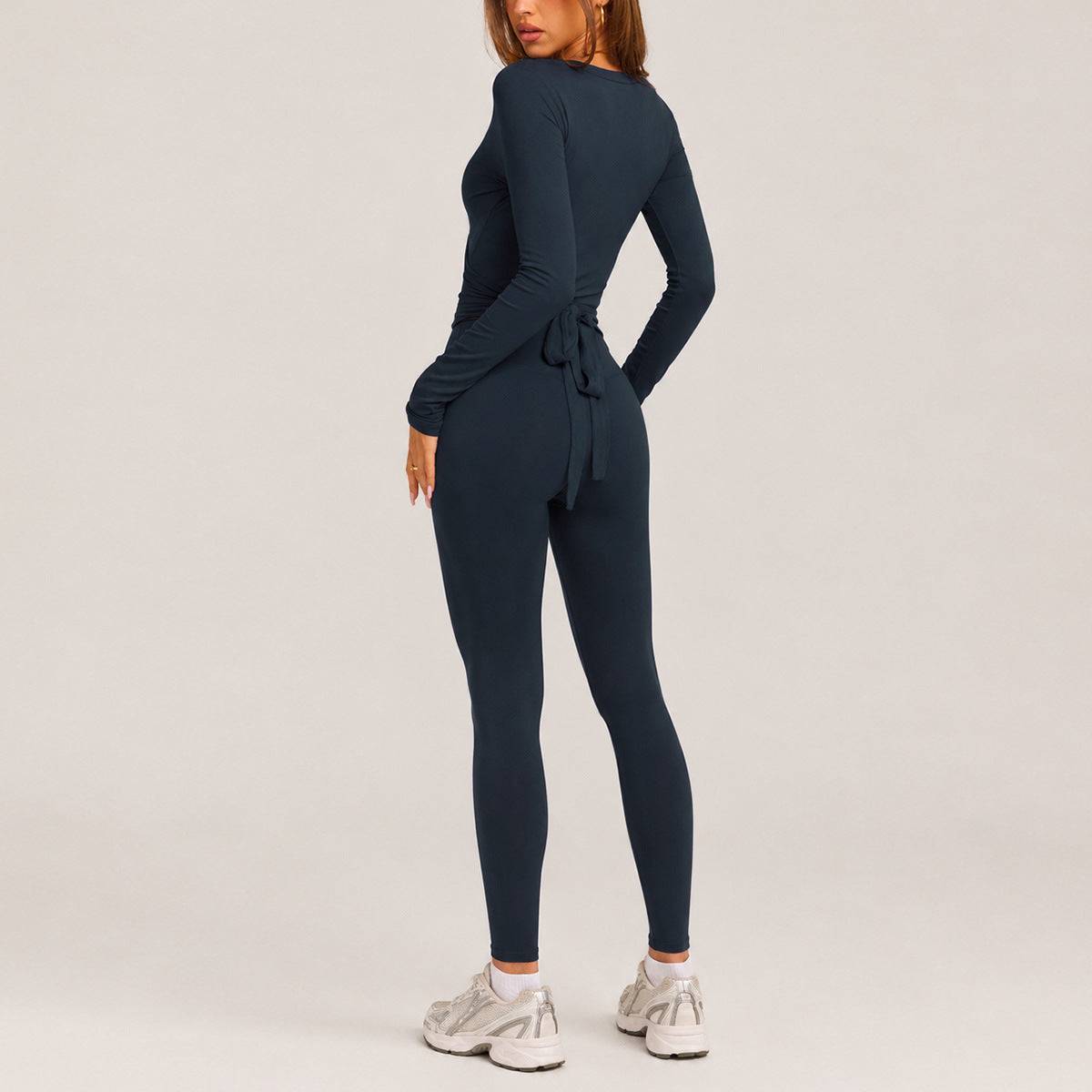 Full Length Sport Yoga Jumpsuit For Women In Stretchy Nylon Fabric Featuring Criss Cross Design With Long Sleeves