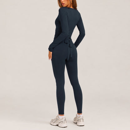 Full Length Sport Yoga Jumpsuit For Women In Stretchy Nylon Fabric Featuring Criss Cross Design With Long Sleeves