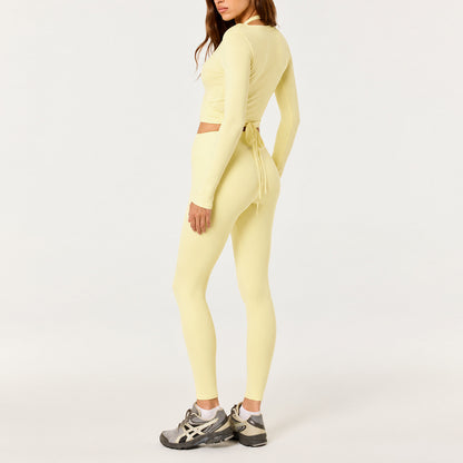 Full Length Sport Yoga Jumpsuit For Women In Stretchy Nylon Fabric Featuring Criss Cross Design With Long Sleeves